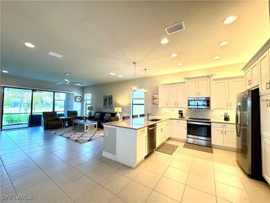 Kitchen with a sink, appliances with stainless ste