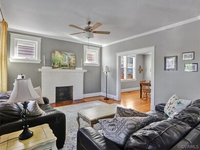 Light Filled Living Room opens to Kitchen and Dining Rooms