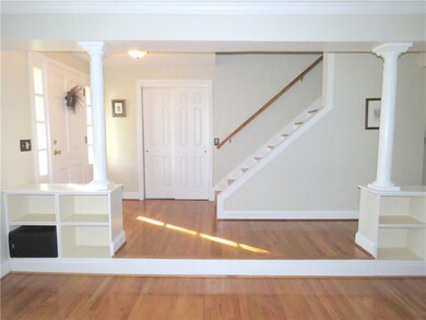 GRAND FOYER/ENTRY with BEAUTIFUL HARDWOOD FLOORING