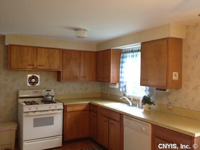 Kitchen. Original kitchen, but so clean. Gas firep