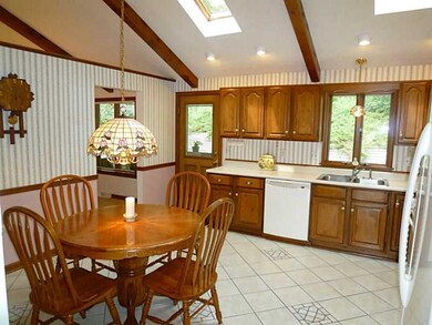Kitchen. Our neutral tile flooring is complimented