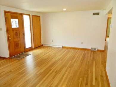 Living Room. Hardwood floors throughout.