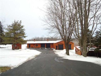 Exterior Front Newly Paved Driveway leads LARGE Ou
