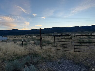 View of mountain background featuring rural landscape