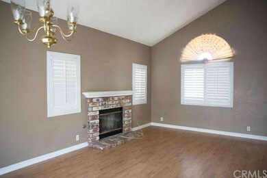 The Living Room with Fireplace.