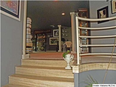 Marble floor entry opens into the living room and 