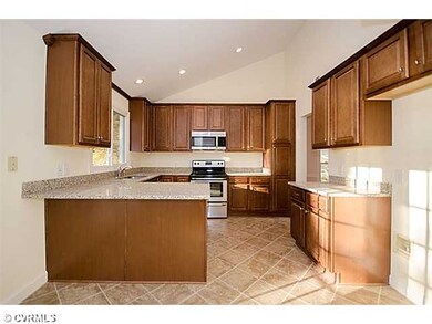 Kitchen - All new maple cabinetry, new recessed li