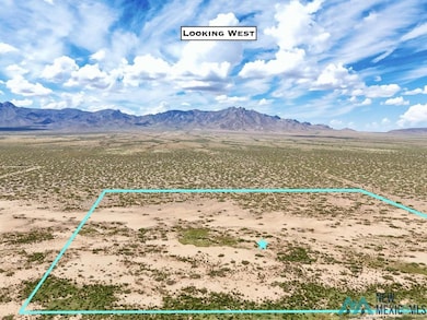 View of rural area featuring mountains and property parcel outlined