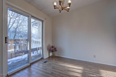 Dining Area With French Doors to Deck