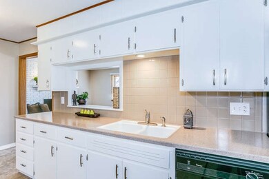 Kitchen Open to the Hearth/Family Room and Firepla