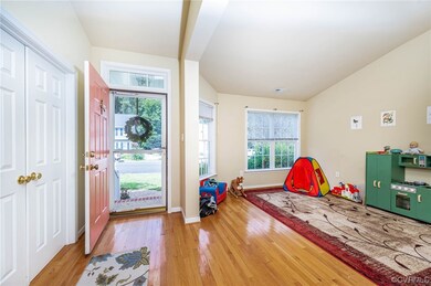 Foyer with view of entry of home, entry to bedroom