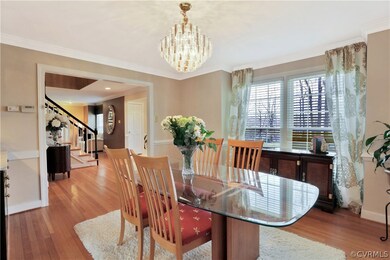 Another view of the dining room showing a bay wind