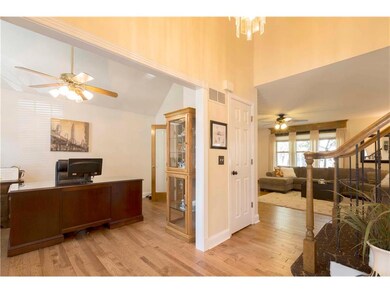 House features a formal living room & family room