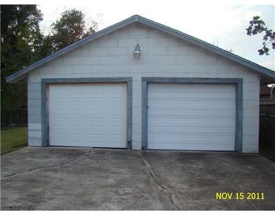 Parking Lot/Garage. 2 Car Garage / work area