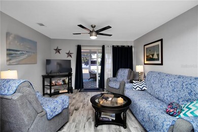 Living room with slider to lanai