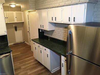 The kitchen is very inviting with its new stainles