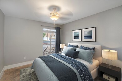 Bedroom featuring a ceiling fan, baseboards, and 