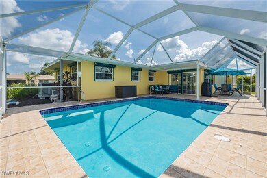 View of swimming pool with a lanai and a patio