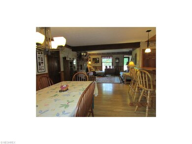 There is a breakfast bar by the kitchen.