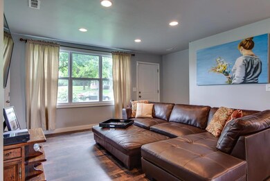 The living room is large, bright and open.  