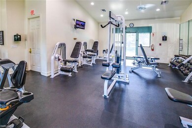 Gym featuring ceiling fan