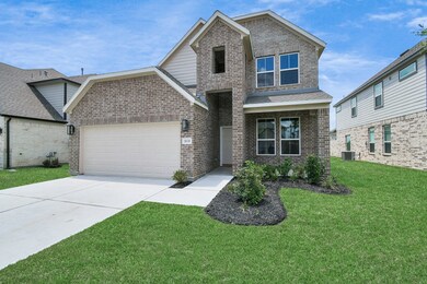 This home boasts lush green grass and meticulous l