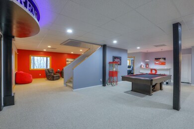 Downstairs: game room/Flex room/Living area/Full bathroom/Office/2 storage closets/screened patio with fireplace.