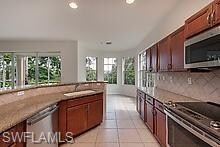 12858 Carrington Cir unit 8-104, Naples, FL 34105 - photo 2