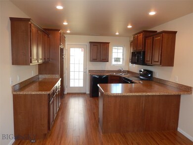Kitchen. Photo of similar home.