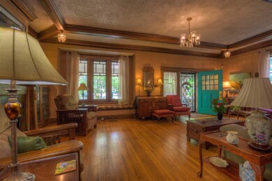 Beautiful Living Room with Hardwood Floors and Nat