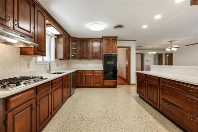 A kitchen every cook would love! Wood cabinets wit