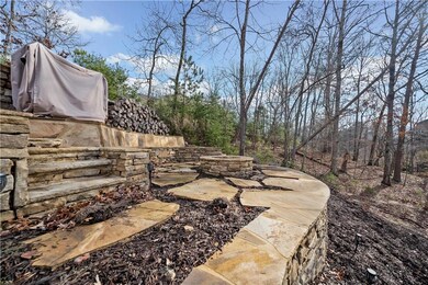 View of patio featuring a fire pit