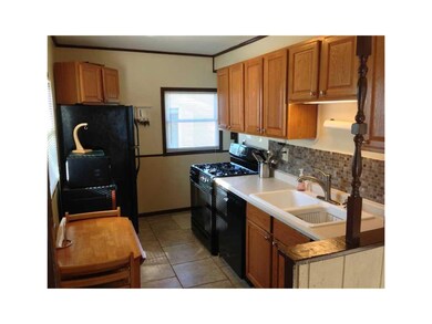 Kitchen. Remodeled with new cabinets, floor and ap