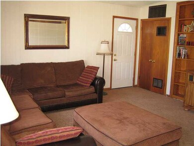 Livingroom has door to yard