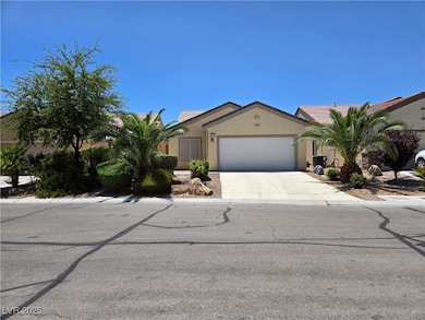 View of front facade featuring an attached garage,