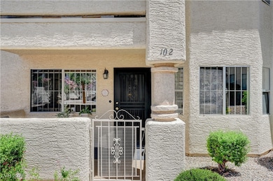 View of exterior entry featuring stucco siding