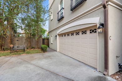 Your gated side entrance is beautifully landscaped