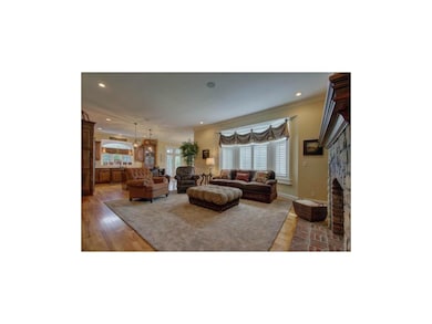 Spacious hearth room with access to back staircase
