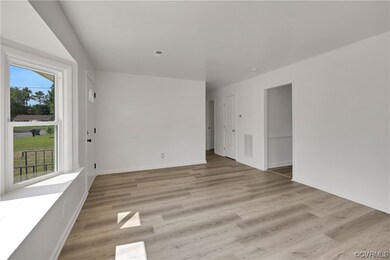 Living/Family Rm sunlight and light LVP flooring