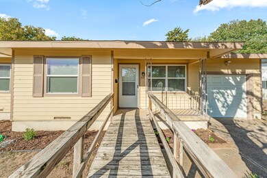 View of front of property featuring covered porch 