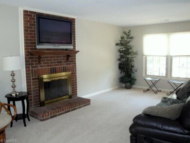 Cozy up in the Living Room by the wood burning fireplace!