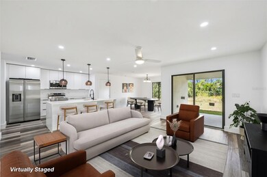 15468 Chamberlain Blvd, Point Charlotte, FL 33953 - photo 5