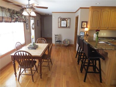 Additional view of Breakfast area with door leading to large patio.