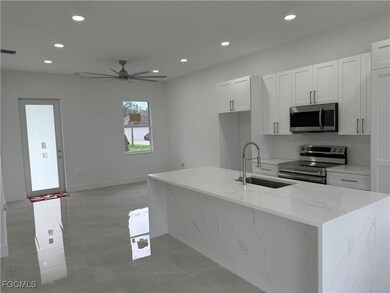 1037 Macy St E, Lehigh Acres, FL 33974 - photo 4