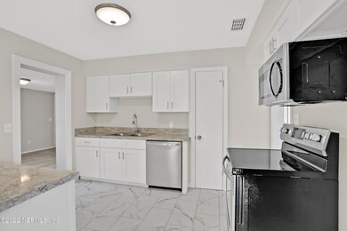 6535 Romilly Dr, Jacksonville, FL 32210 - photo 6