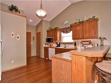 Kitchen - beautiful bamboo wood floors Laundry is 