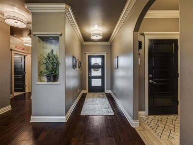 Foyer featuring dark hardwood / wood-style floorin