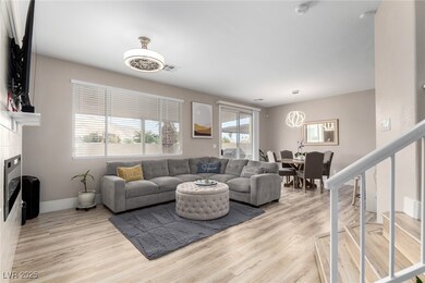 Living area featuring light wood-style flooring, b