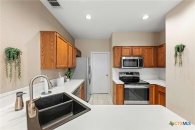 Kitchen area Door to Garage