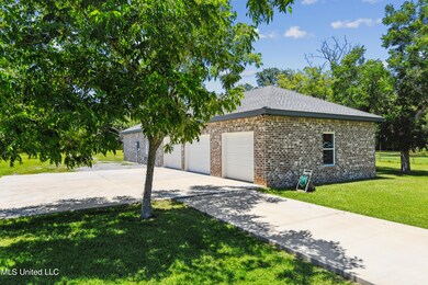 Triple garage plus rv pad